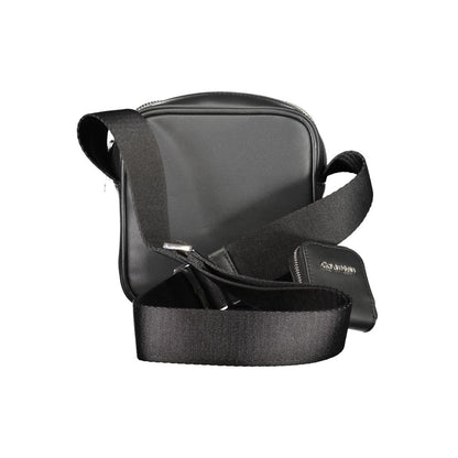 Shoulder Bag by Calvin Klein for men in polyester black presents a statuesque silhouette, showcasing a secure zipper and statuesque removable-pouch, internal-pockets & coin-purse with versatile shoulder-strap & adjustable-strap for a sophisticated look.