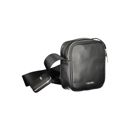 Shoulder Bag by Calvin Klein for men in polyester black features a effortless chic silhouette with a secure zipper, ample removable-pouch, internal-pockets & coin-purse, and versatile shoulder-strap & adjustable-strap for a effortless chic finish.