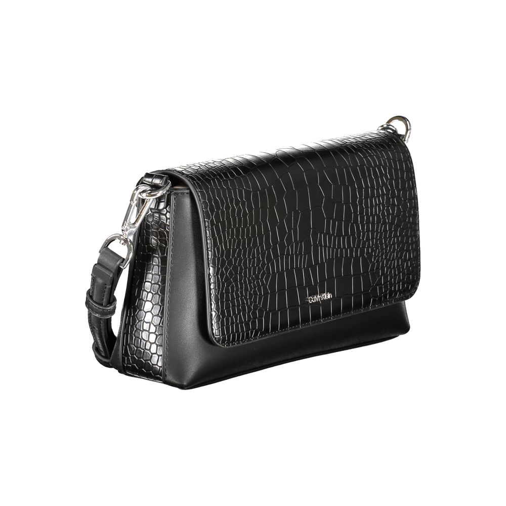 Shoulder Convertible Handbag by Calvin Klein for women in polyester embossed faux leather black features a refined silhouette, showcasing a secure and refined cardholder with versatile shoulder-strap, adjustable-strap & handle for a refined finish.