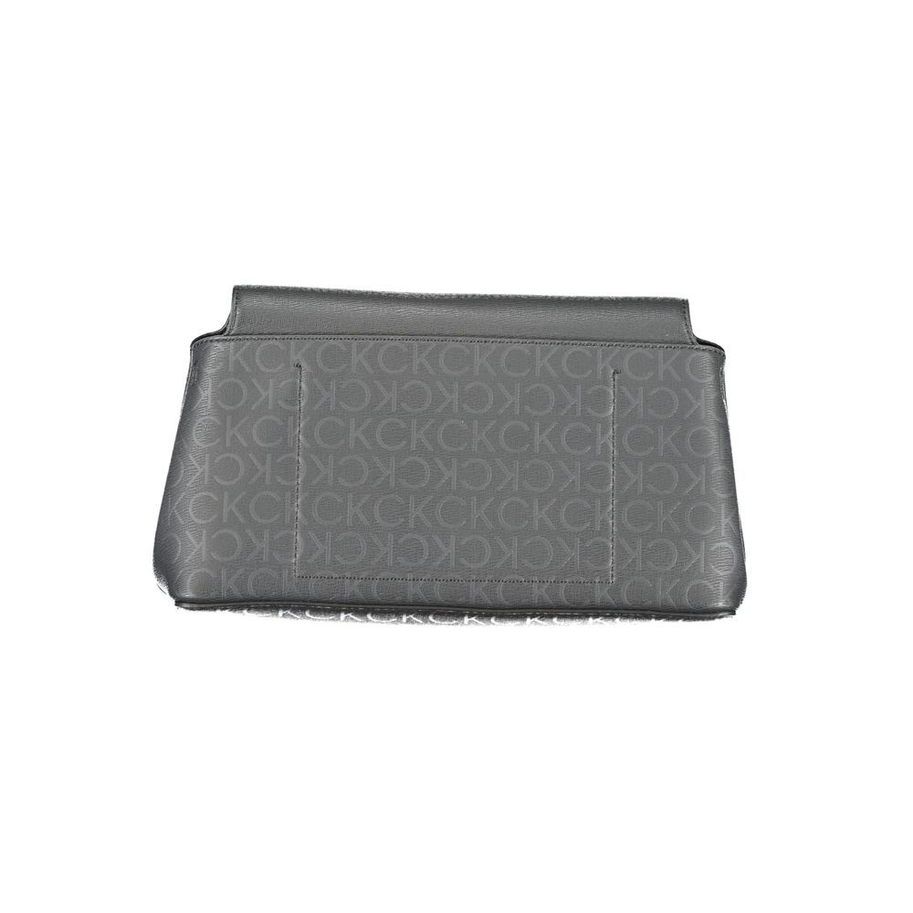 Shoulder Handbag by Calvin Klein for women in polyester black presents a ornamental silhouette, showcasing a secure snap, ample internal-pockets, and versatile shoulder-strap & adjustable-strap for a ornamental finish.