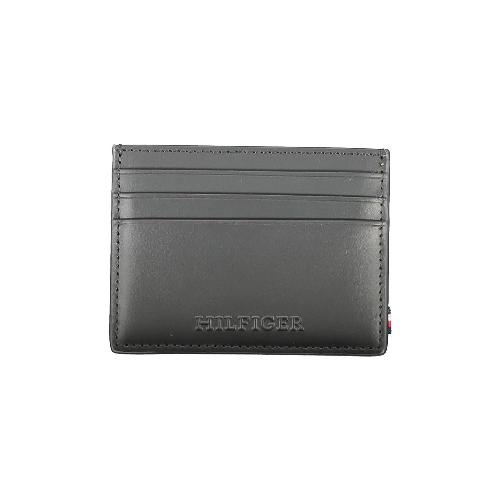 Cardholder Wallet by Tommy Hilfiger for men in leather black showcases a refined silhouette, artfully detailed with the signature style of the Leather Cardholder Wallet and functional card-organization.