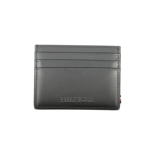 Cardholder Wallet by Tommy Hilfiger for men in leather black showcases a refined silhouette, artfully detailed with the signature style of the Leather Cardholder Wallet and functional card-organization.