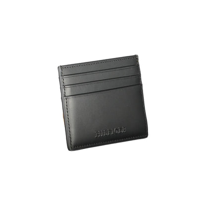 Cardholder Wallet by Tommy Hilfiger for men in leather black showcases a refined silhouette, artfully detailed with the signature style of the Leather Cardholder Wallet and functional card-organization.
