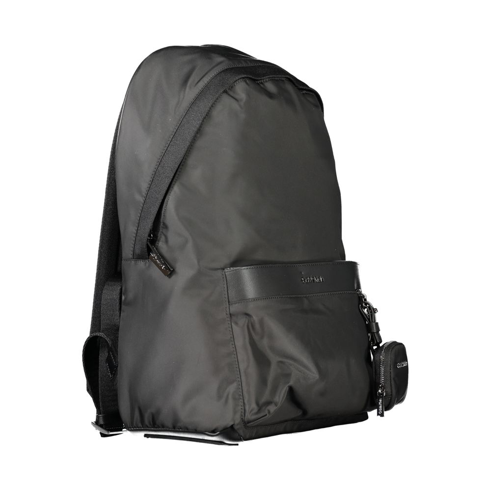 Backpack by Calvin Klein for men in polyester black features an stately silhouette from the Polyester Backpack range, with a secure zipper, ample built-in-compartments, removable-pouch, external-pockets, internal-pockets, laptop-compartment & coin-purse, and versatile backpack-strap, adjustable-strap & handle.