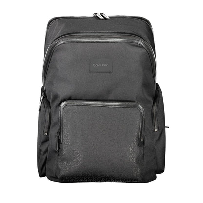 Backpack by Calvin Klein for men in polyester black & signature features a stately Polyester Backpack design, showcasing a secure zipper, ample external-pockets, internal-pockets & laptop-compartment, and versatile backpack-strap, adjustable-strap & handle for a stately finish.