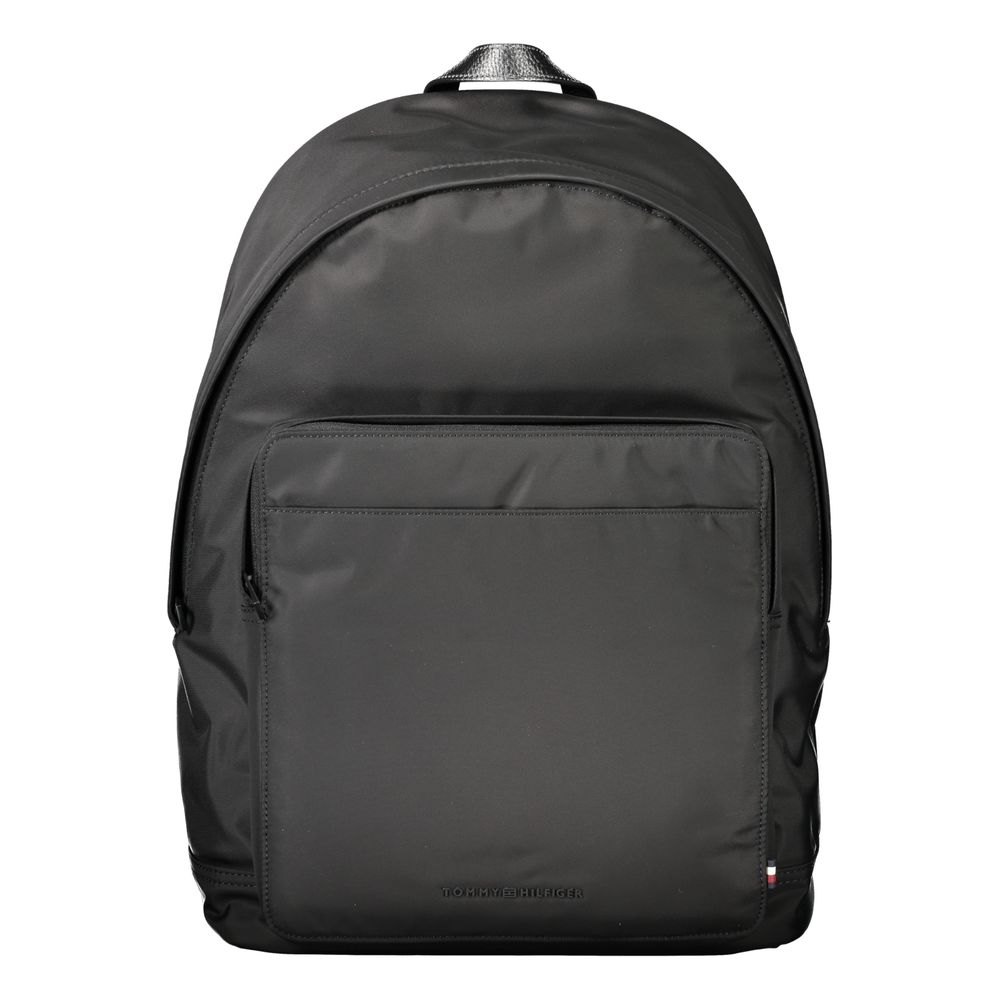 Backpack by Tommy Hilfiger for men in polyester black presents a stately Polyester Backpack design, showcasing a secure zipper with ample external-pockets, internal-pockets & laptop-compartment and versatile handle, backpack-strap & adjustable-strap for a stately finish.