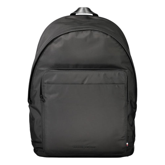 Backpack by Tommy Hilfiger for men in polyester black presents a stately Polyester Backpack design, showcasing a secure zipper with ample external-pockets, internal-pockets & laptop-compartment and versatile handle, backpack-strap & adjustable-strap for a stately finish.