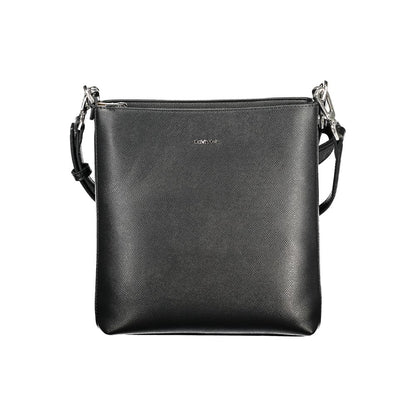 2-in-1 Shoulder & Crossbody Convertible Handbag by Calvin Klein for women in polyester black presents a enviable design with a secure zipper, ample internal-pockets, and versatile crossbody-strap, shoulder-strap, adjustable-strap & handle for a sophisticated look.
