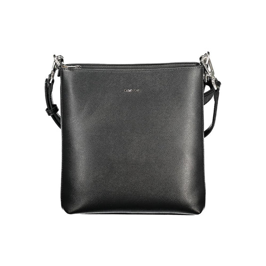 2-in-1 Shoulder & Crossbody Convertible Handbag by Calvin Klein for women in polyester black presents a enviable design with a secure zipper, ample internal-pockets, and versatile crossbody-strap, shoulder-strap, adjustable-strap & handle for a sophisticated look.
