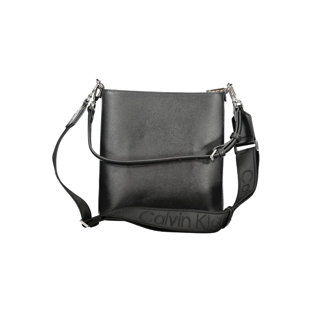 2-in-1 Shoulder & Crossbody Convertible Handbag by Calvin Klein for women in polyester black features an exquisite silhouette, showcasing a secure zipper, ample internal-pockets, and exquisite crossbody-strap, shoulder-strap, adjustable-strap & handle for a sophisticated finish.