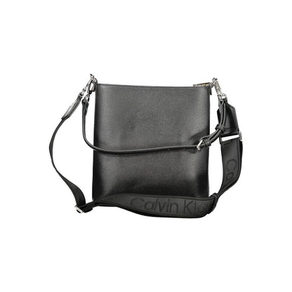 2-in-1 Shoulder & Crossbody Convertible Handbag by Calvin Klein for women in polyester black features an exquisite silhouette, showcasing a secure zipper, ample internal-pockets, and exquisite crossbody-strap, shoulder-strap, adjustable-strap & handle for a sophisticated finish.