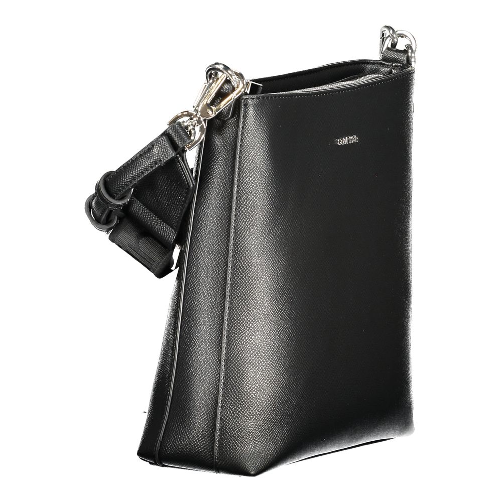 2-in-1 Shoulder & Crossbody Convertible Handbag by Calvin Klein for women in polyester black presents a exquisite silhouette, showcasing a secure zipper and organized internal-pockets with versatile crossbody-strap, shoulder-strap, adjustable-strap & handle.