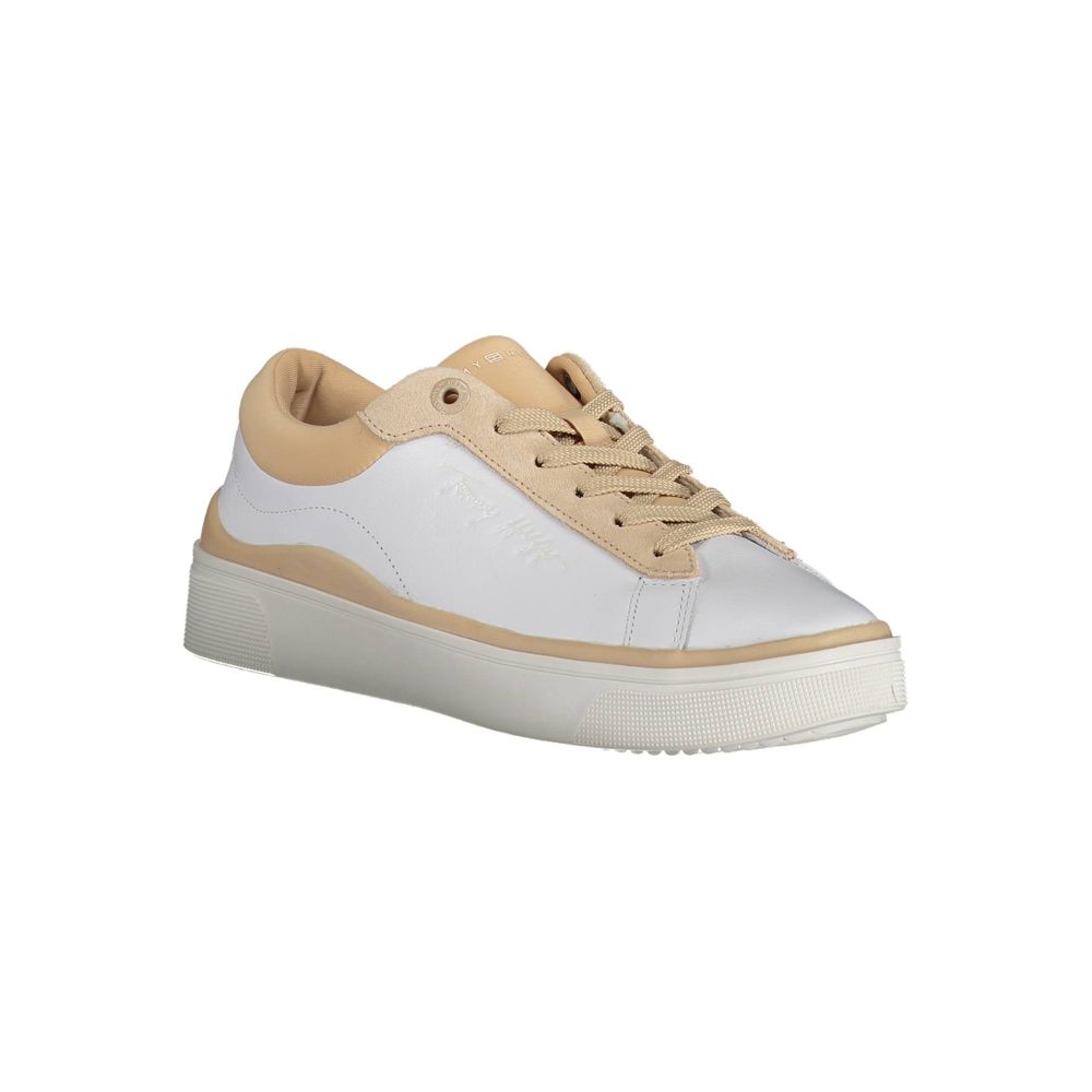 Sneakers by Tommy Hilfiger for women in polyester white presents a sumptuous silhouette, artfully capturing the essence of the Women's Fashion Polyester Sneakers with its sumptuous fashion style design.