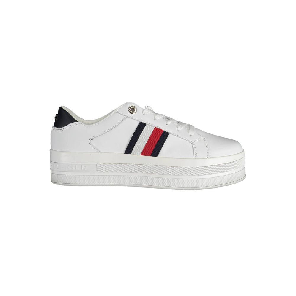 Sneakers by Tommy Hilfiger for women in cotton polyester white presents a sumptuous silhouette, artfully capturing the essence of the Women's Fashion Cotton Polyester Sneakers with its sumptuous fashion style design.