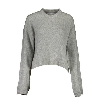 Sweater by Calvin Klein for women in wool gray showcases a sumptuous silhouette, artfully finished with a sumptuous round neckline and long-sleeve for a sophisticated, sumptuous look.