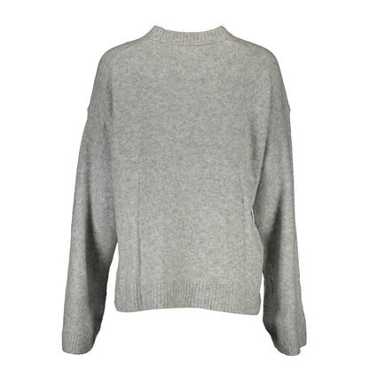 Sweater by Calvin Klein for women in wool gray showcases a discreet silhouette, finished with a discreet and for a discreet look.