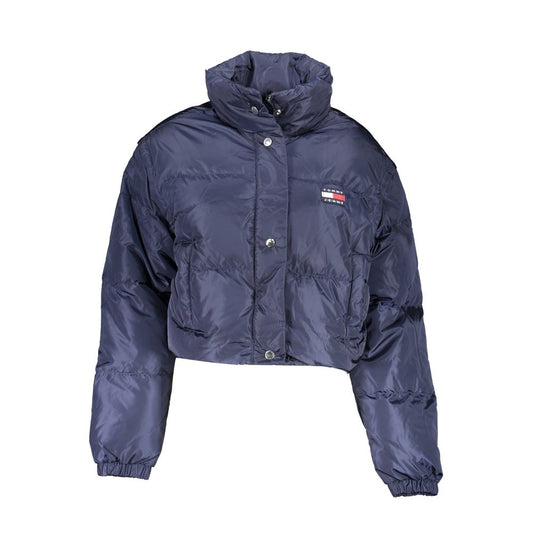 Jacket by Tommy Hilfiger for women in nylon blue presents a impeccable silhouette, showcasing distinct pockets and a impeccable for a sophisticated finish.