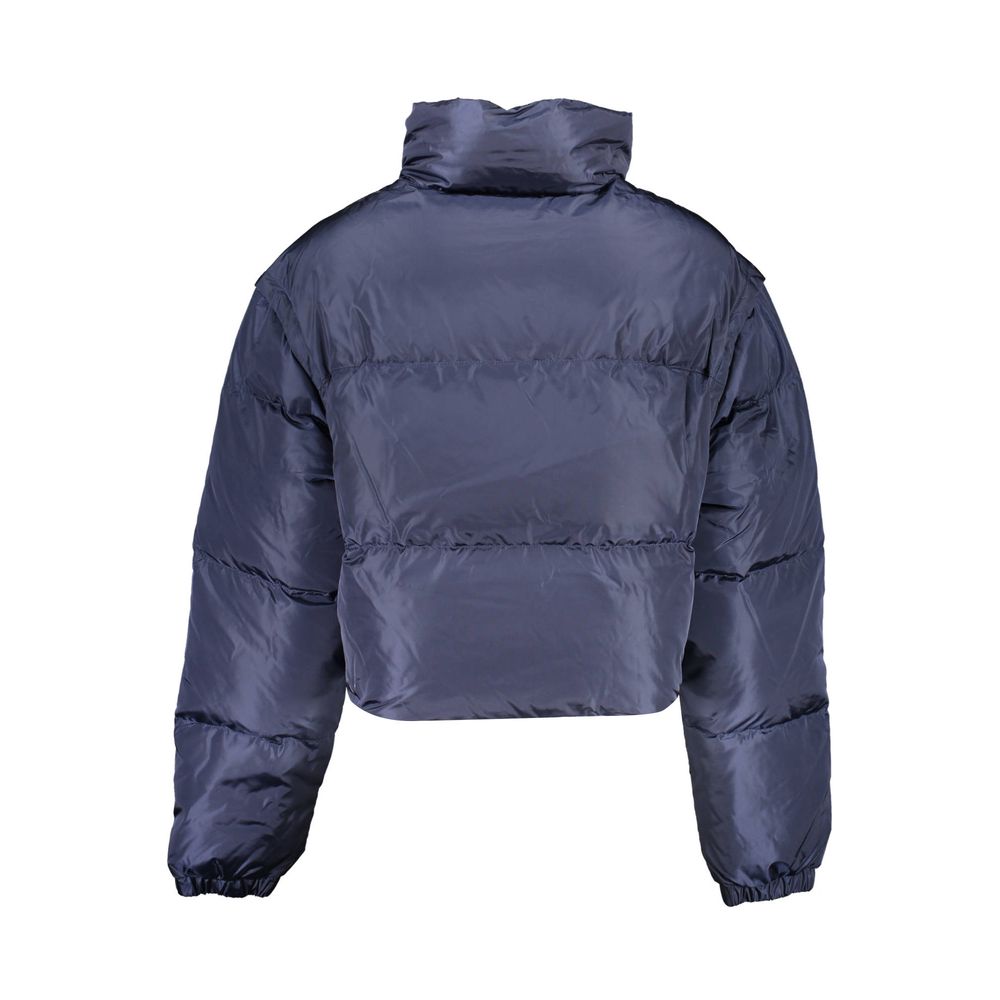 Jacket by Tommy Hilfiger for women in nylon blue features an utilitarian silhouette with a refined , showcasing sophisticated pockets for an utilitarian aesthetic.