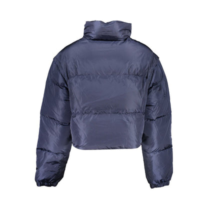 Jacket by Tommy Hilfiger for women in nylon blue features an utilitarian silhouette with a refined , showcasing sophisticated pockets for an utilitarian aesthetic.