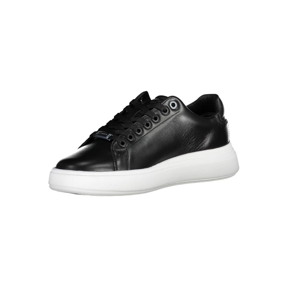 Sneakers by Calvin Klein for women in polyester black presents a sumptuous silhouette from the Women's Fashion Polyester Sneakers collection, showcasing a sumptuous fashion style for an elevated aesthetic.