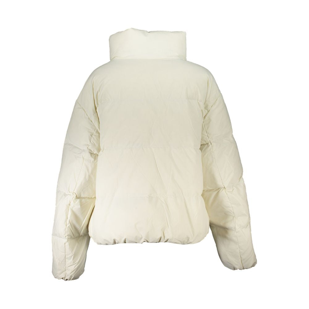 This Jacket by Calvin Klein for women in nylon & polyester white showcases a magnificent silhouette, meticulously crafted with a distinctive and functional pockets for a magnificent finish.