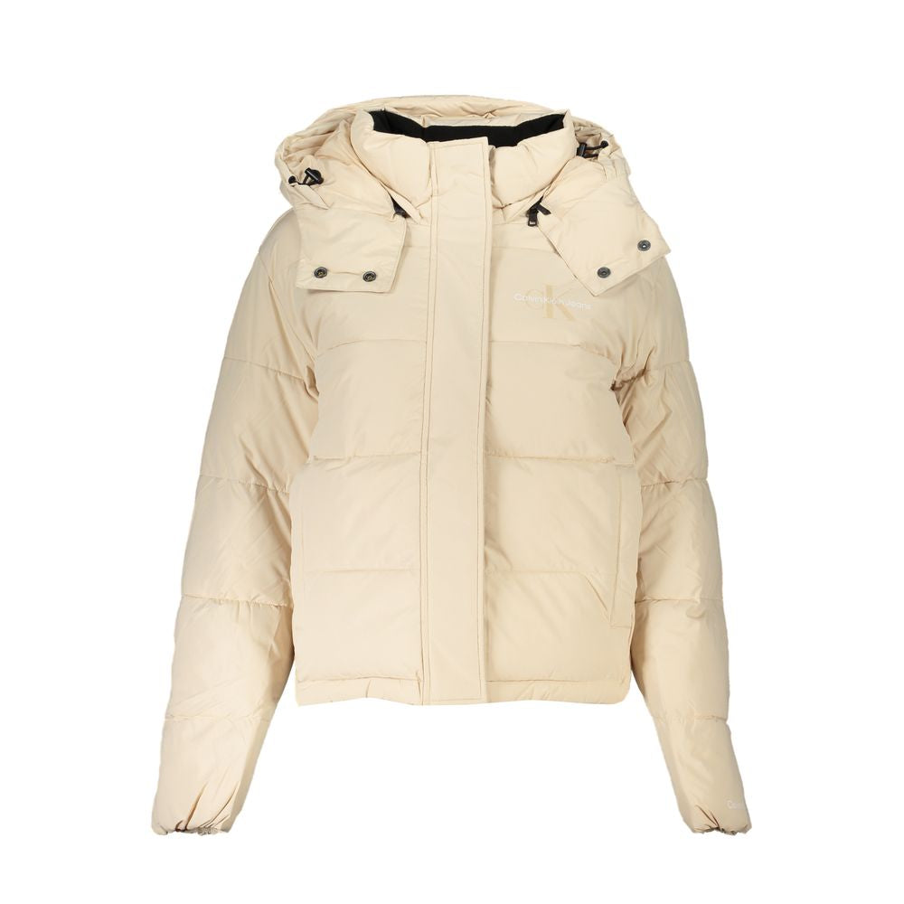 Hooded Jacket by Calvin Klein for women in polyester beige presents a impeccable silhouette, showcasing distinct pockets & hooded and a impeccable hooded neckline for a sophisticated finish.