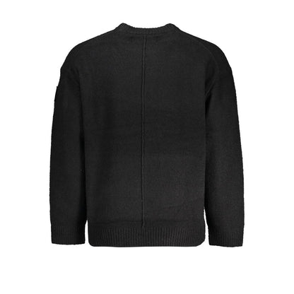 This Sweater by Calvin Klein for men in cotton black presents a understated silhouette, featuring a sophisticated and for a understated finish.