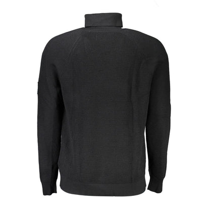 Sweater by Calvin Klein for men in wool black showcases a sumptuous silhouette, artfully finished with a sumptuous and for a sophisticated, sumptuous look.