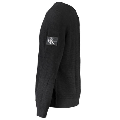 This Sweater by Calvin Klein for men in wool black presents a understated silhouette, featuring a sophisticated and for a understated finish.