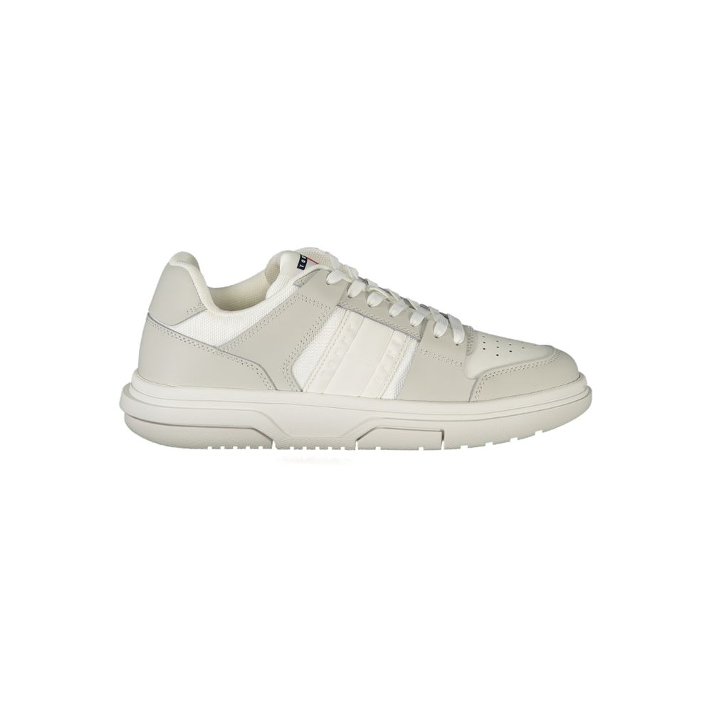 Sneakers by Tommy Hilfiger for women in polyester gray, white & print presents a sumptuous silhouette as Women's Fashion Polyester Sneakers, expertly defined by a sumptuous fashion style for a sumptuous, high-fashion look.