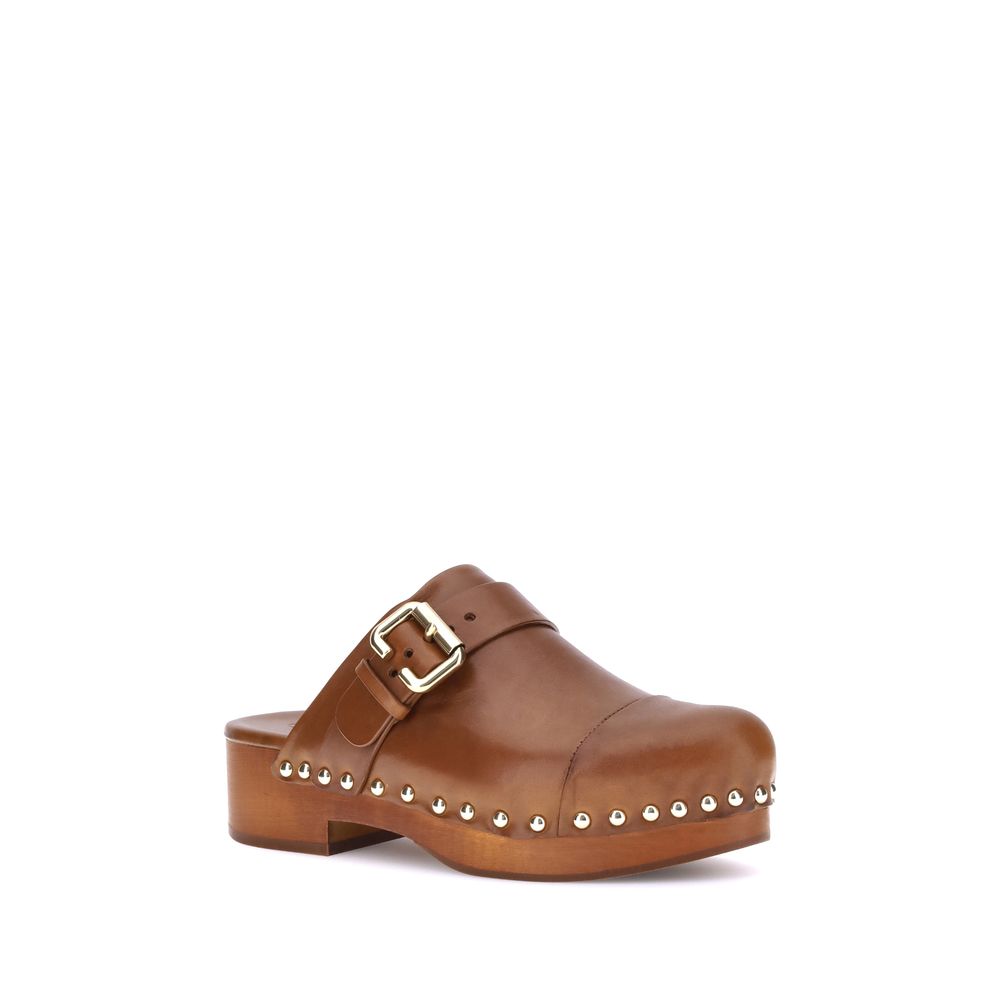 Platform Clogs Mules Sandals by Chloé for women in bos taurus calfskin leather brown features an effortlessly chic silhouette from the Paddington Women's Bos Taurus Calfskin Leather Platform Clogs Mules Sandals collection, showcasing a effortlessly chic platform and elegant round toe style.