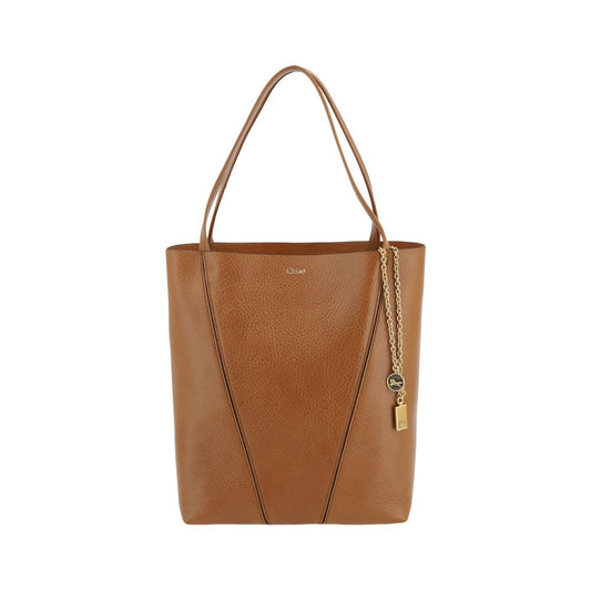Shoulder Bag by Chloé for women in bos taurus calf grained leather brown & monogram presents a versatile silhouette, showcasing a secure and versatile single-compartment with versatile shoulder-strap & handle for a sophisticated look.
