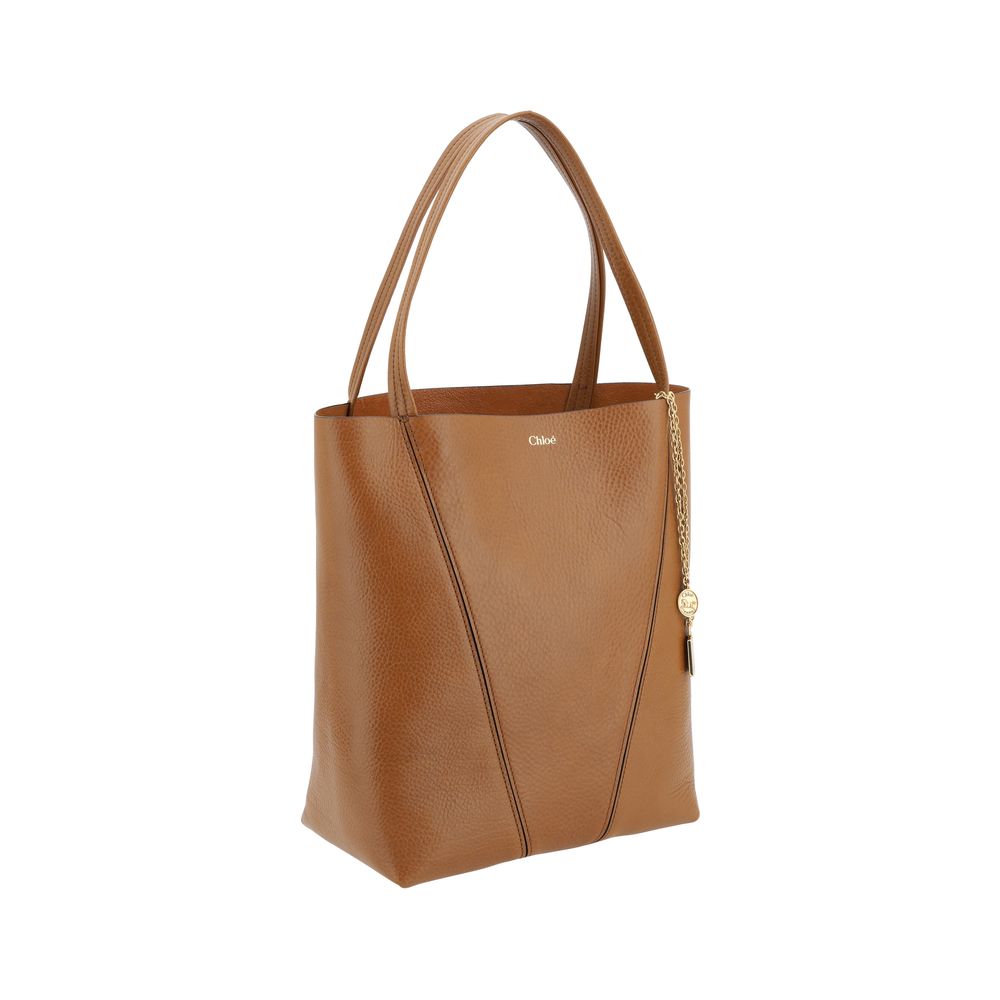 Shoulder Bag by Chloé for women in bos taurus calf grained leather brown & monogram features a enviable silhouette, showcasing a secure , ample single-compartment, and enviable shoulder-strap & handle for a enviable finish.