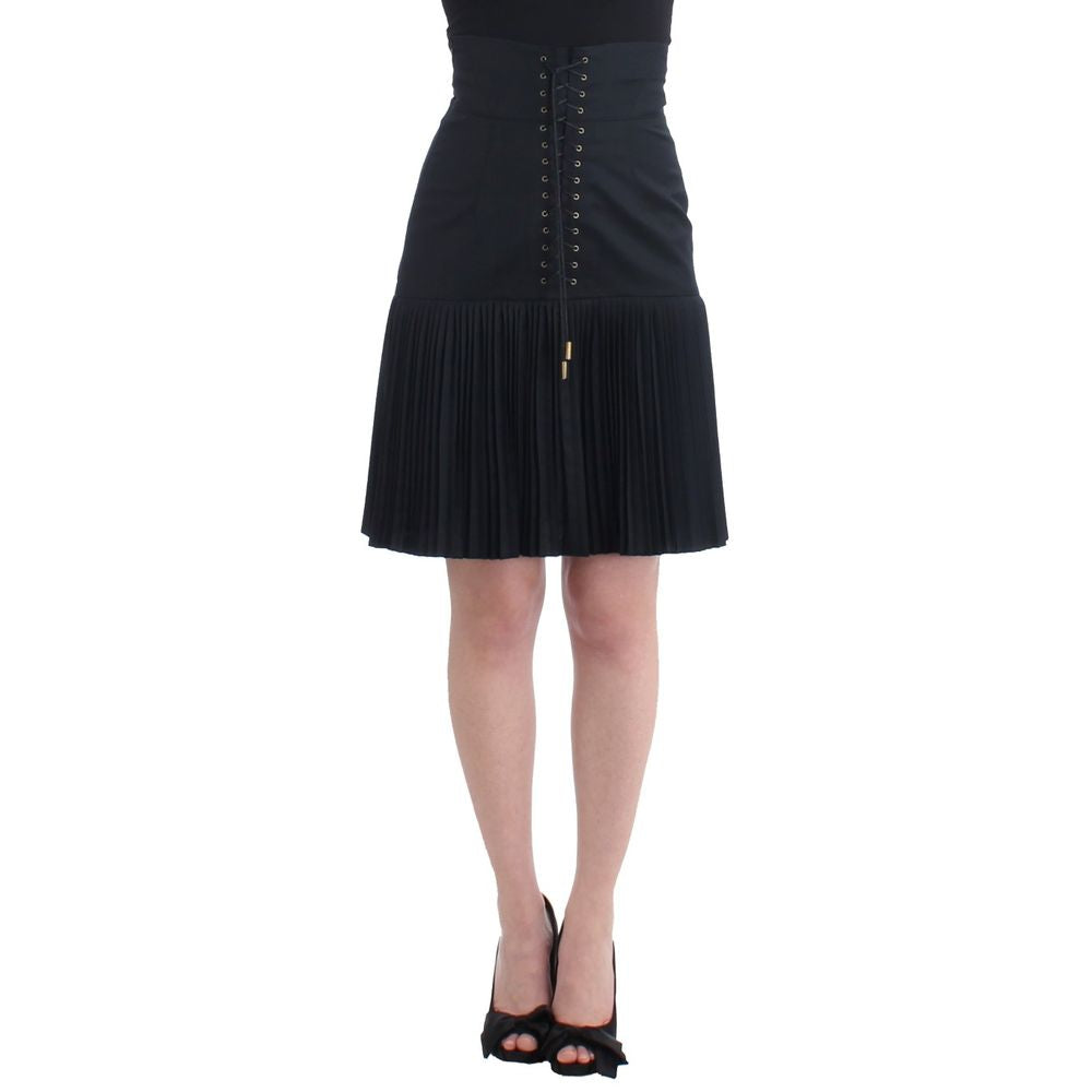 Skirt by Roberto Cavalli for women in wool black showcases a sultry silhouette, elegantly defined by its mini and the sophisticated sultry design of the Women's Pleated High Rise Wool Skirt.
