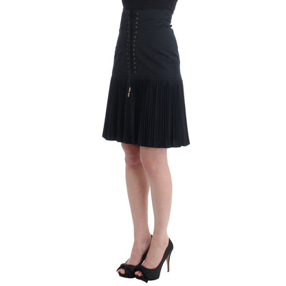 Skirt by Roberto Cavalli for women in wool black showcases a dramatic silhouette, artfully capturing the essence of the Women's Pleated High Rise Wool Skirt in a dramatic mini cut for a refined look.
