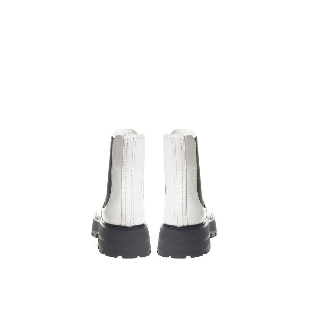 Chelsea Boots by Alexander McQueen for women in leather black & white features an effortless chic silhouette from the Women's Leather Chelsea Boots collection, showcasing a effortless chic and refined for an effortless chic look.