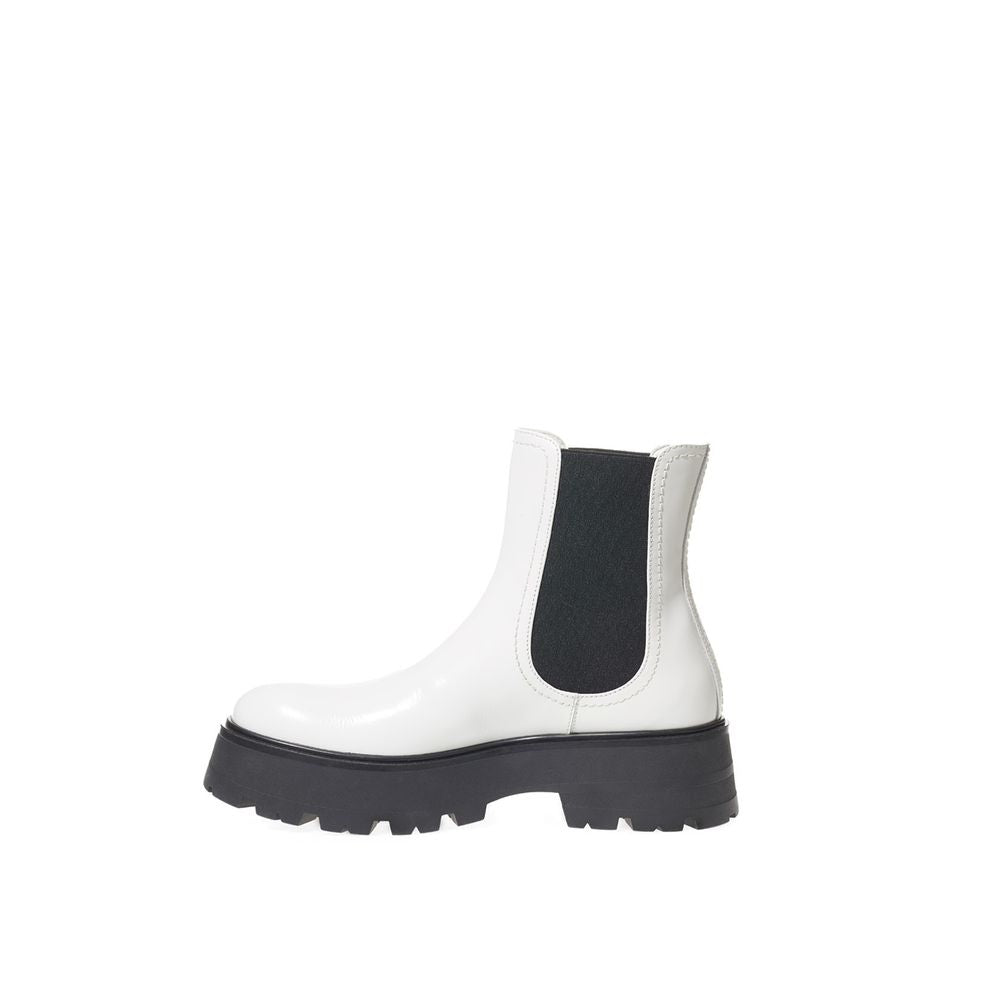 Chelsea Boots by Alexander McQueen for women in leather black & white features an avant-garde Women's Leather Chelsea Boots silhouette, defined by a sophisticated and a avant-garde .