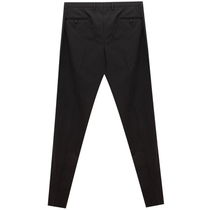Jeans by Dolce & Gabbana for men in wool & silk satin black features a refined silhouette with a refined slim, defined by a and a refined long for a refined finish.