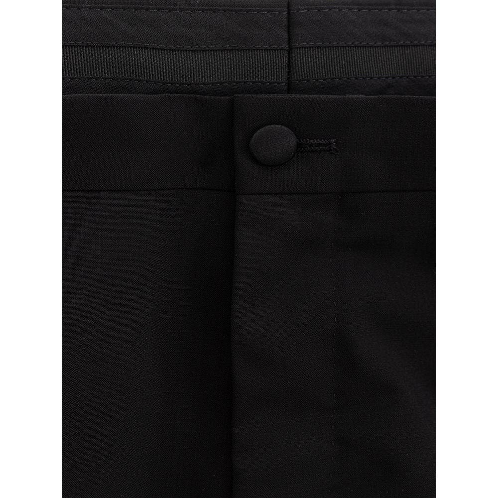 Jeans by Dolce & Gabbana for men in wool & silk satin black features a polished silhouette with a polished slim, reaching a polished long and finished with a polished .