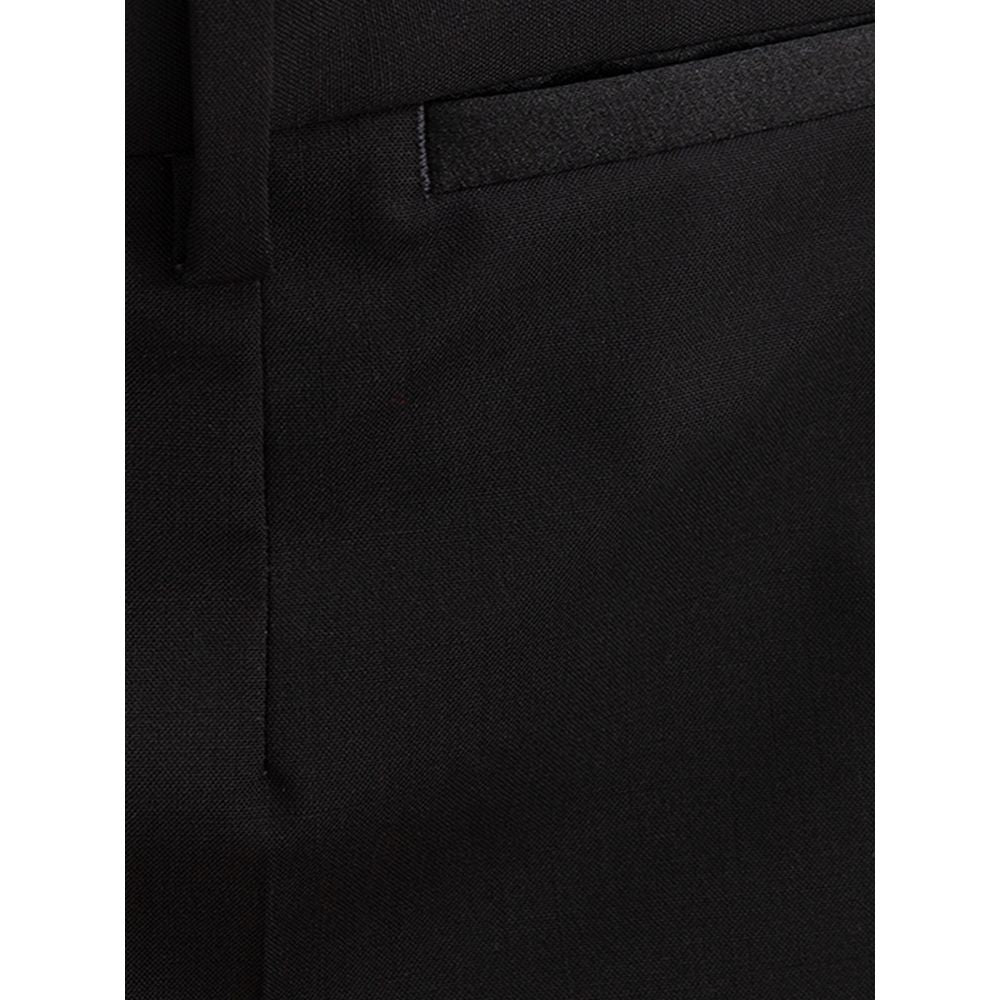 Jeans by Dolce & Gabbana for men in wool & silk satin black presents a tailored silhouette, showcasing a tailored slim and long cut with a refined for a truly tailored aesthetic.