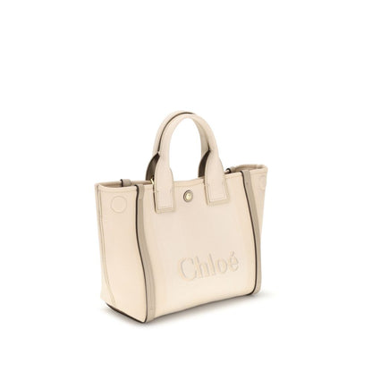 Shoulder Tote Bag by Chloé for women in leather & cotton beige, signature & monogram showcases a enviable silhouette, artfully detailed with a secure snap & magnetic, organized , and versatile shoulder-strap, adjustable-strap & handle for a enviable look.