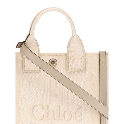 Shoulder Tote Bag by Chloé for women in leather & cotton beige, signature & monogram features a enviable silhouette, showcasing a secure snap & magnetic, ample , and enviable shoulder-strap, adjustable-strap & handle for a enviable finish.