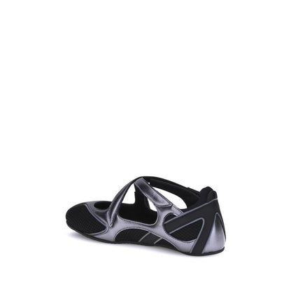 Sliders Flat Shoes by The Attico for women in polyester polyurethane & bos taurus calf leather black features an statuesque silhouette from the Nomad Women's Polyester Polyurethane & Bos Taurus Calf Leather Sliders Flat Shoes collection, showcasing a and a statuesque for a statuesque look.
