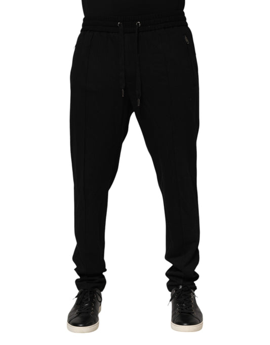 Joggers by Dolce & Gabbana for men in cotton nylon rayon & viscose black features an sartorial tapered-leg, skinny & regular-fit and long with a cut for a sartorial finish.
