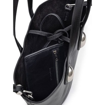 Mini Shoulder Dome Bag by Alexander Wang for women in leather & metal black presents a statuesque silhouette, showcasing a secure and statuesque single-compartment with versatile shoulder-strap, adjustable-strap & handle for a sophisticated look.
