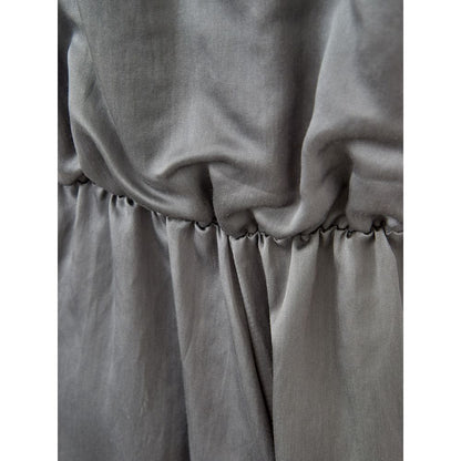 Dress by Lardini for women in cotton & silk gray features an eye catching silhouette with a sophisticated v-neck neckline, elegant , and a refined for a eye catching aesthetic.