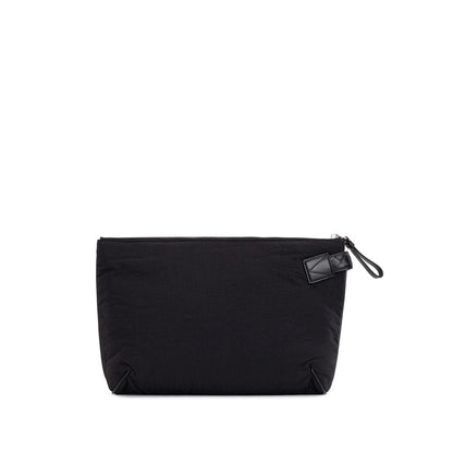 Clutch Handbag by Bottega Veneta for men in nylon & leather black features a sculptural silhouette with a secure zipper, ample single-compartment & internal-pockets, and versatile handle for a sculptural finish.