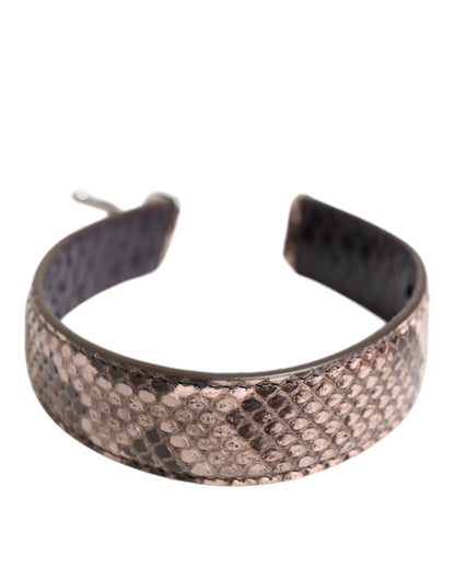 Shoulder Strap by Dolce & Gabbana for women in python leather brown & silver features a effortlessly chic design, perfectly complementing the signature look of the Python Leather Shoulder Strap.