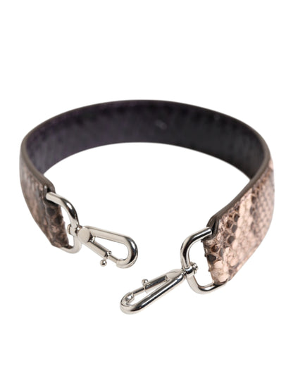 Shoulder Strap by Dolce & Gabbana for women in python leather brown & silver features a dynamic silhouette, artfully enhancing the dynamic design of this Python Leather Shoulder Strap.