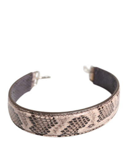 Shoulder Strap by Dolce & Gabbana for women in python leather beige, brown & silver features a chic design, presenting a refined view of the Python Leather Shoulder Strap with a chic finish.